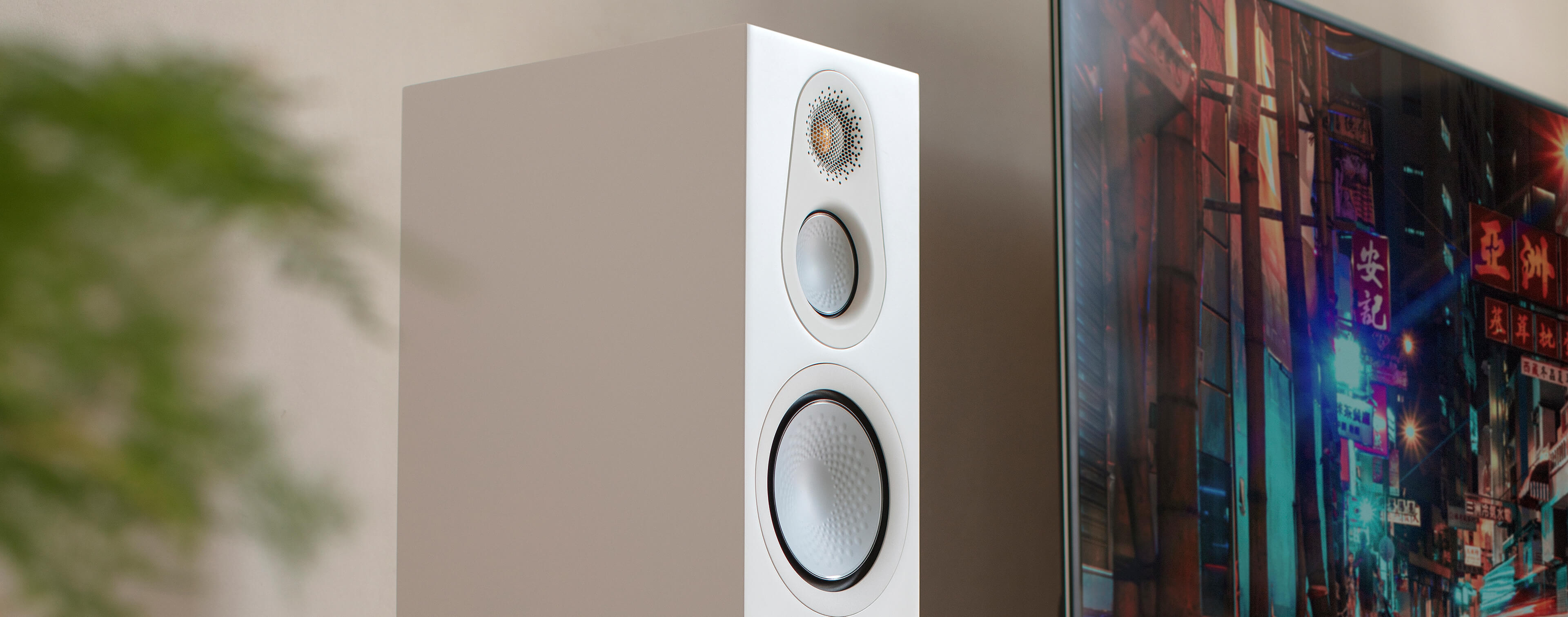 Lifestyle shot of Monitor Audio's Silver 300 7G, in a satin white finish.