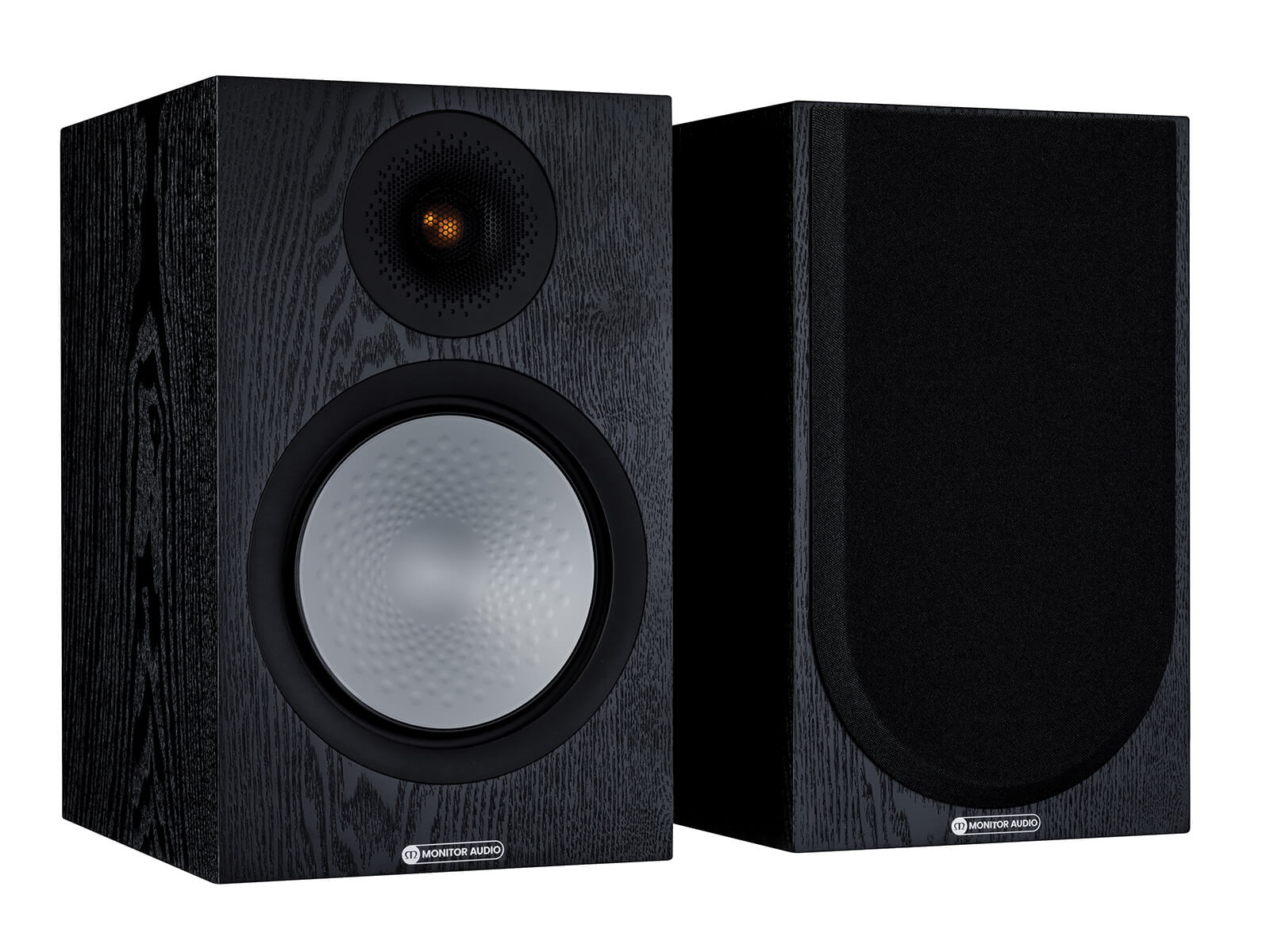 A pair of Monitor Audio's Silver 100 7G, in a black oak finish, iso view, with and without grilles.